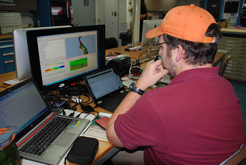 After overnight multibeam mapping data collection over the Pea Island seeps, Jason Chaytor reviewed the data for evidence of methane bubble plumes in the water column.