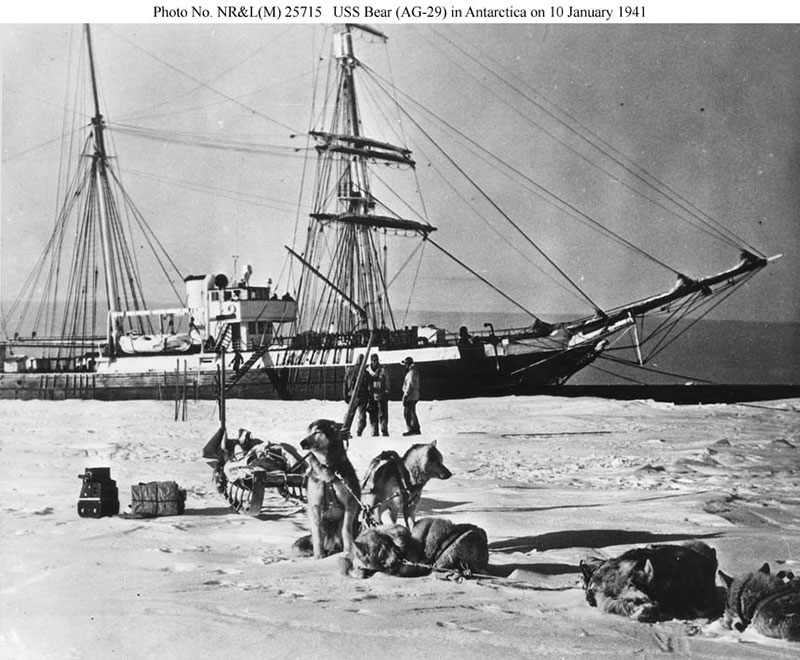 USS <em>Bear</em> moored to the ice shelf at West Base, Antarctica, in January 1941 showing the vessel's pre-World War II configuration.