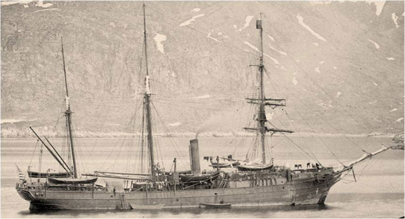 USS <em>Bear</em> anchored in Godhaven Harbor, Greenland, in 1884 as part of the famous Greely Relief Expedition.