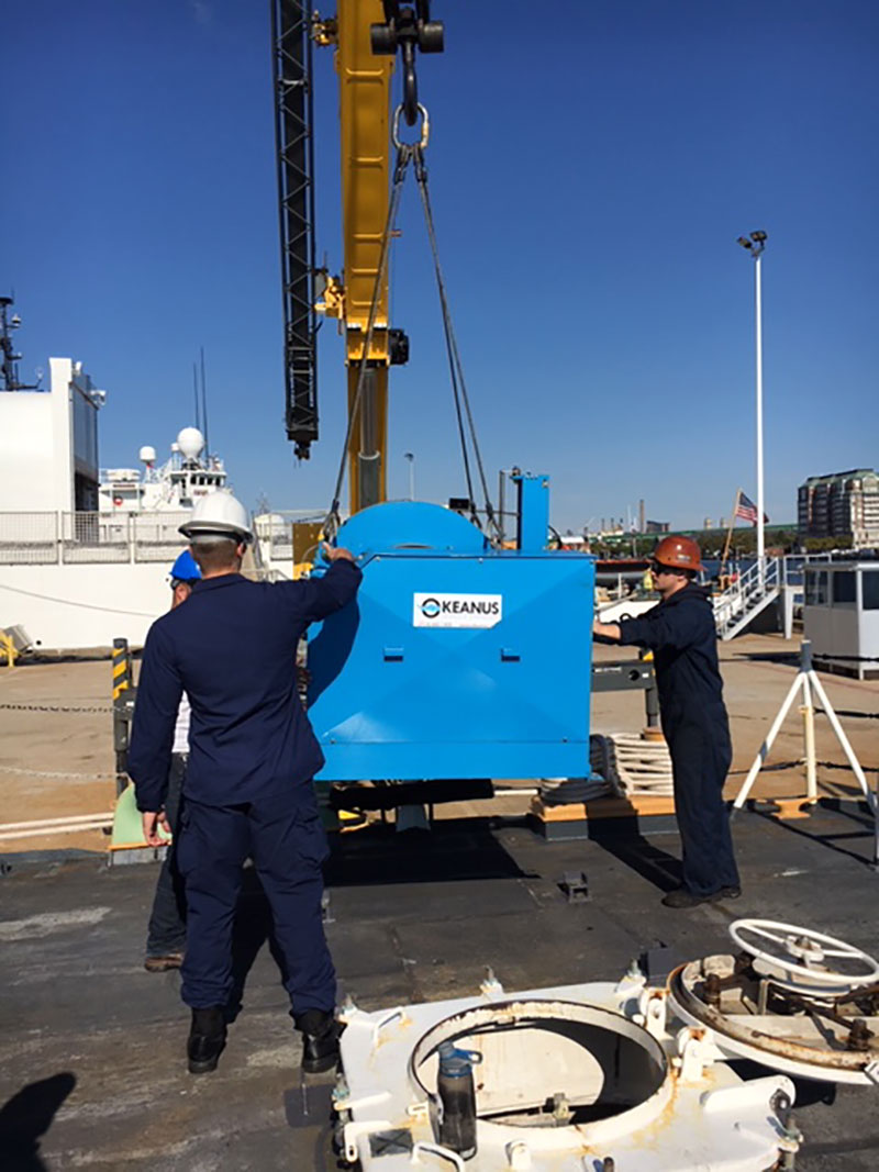 Crane lifting the winch off the fantail of the Bear.