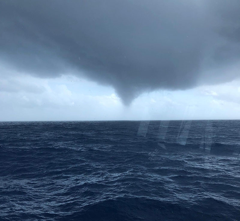 Photo of the water spout as seen from R/V Point Sur. Image courtesy of Joshua Bierbaum.