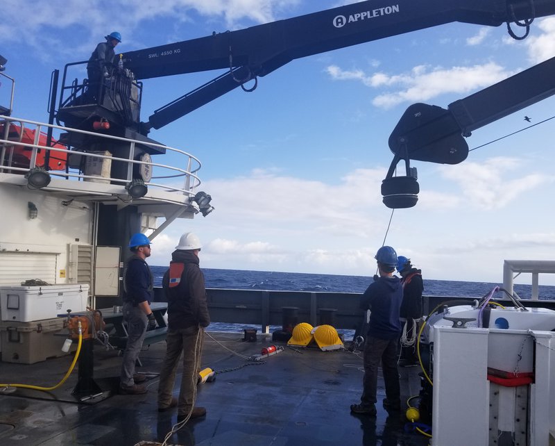 The round attachment at the end of the crane prevents the ROV from widely swinging back and forth with the movement of the ship.