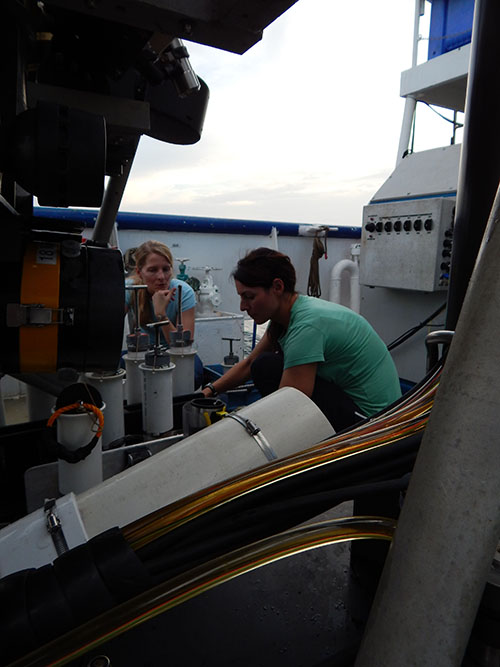 Principal investors Dr. Leila Hamdan and Melanie Damour preparing push cores for sediment collection.