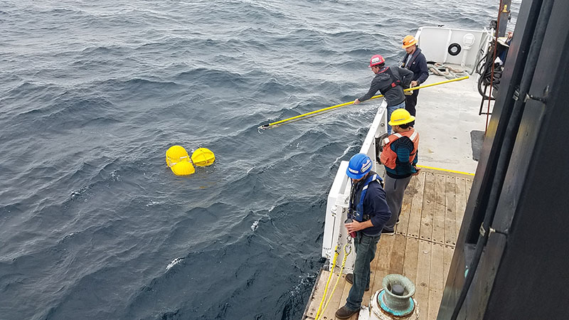 Recovering acoustic landers from the seafloor aboard R/V Point Sur.