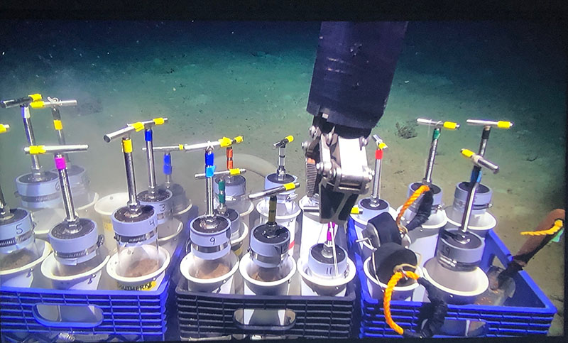Push core tubes headed down to the deep sea aboard the ROV.