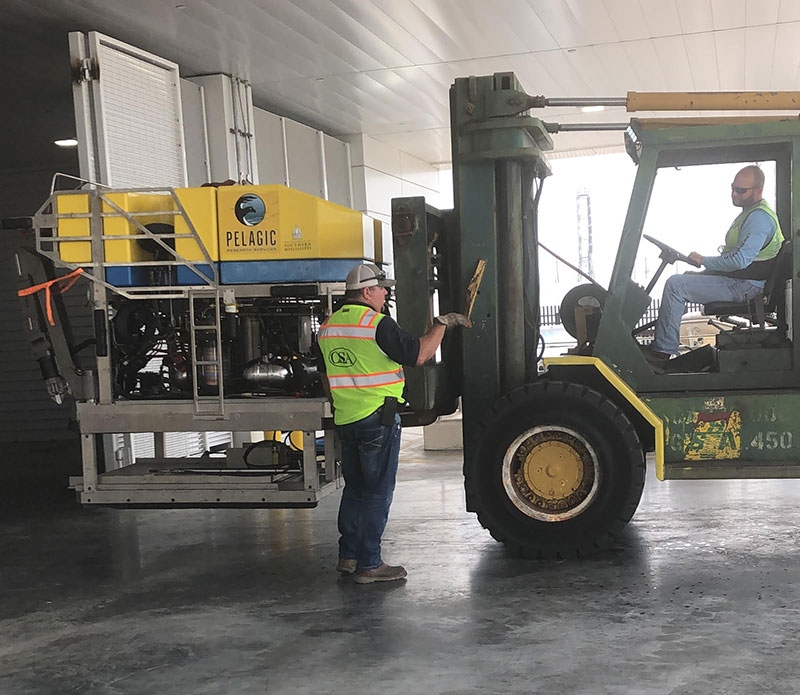 ROV <em>Odysseus</em> being transferred from the Marine Research Center to the ship.