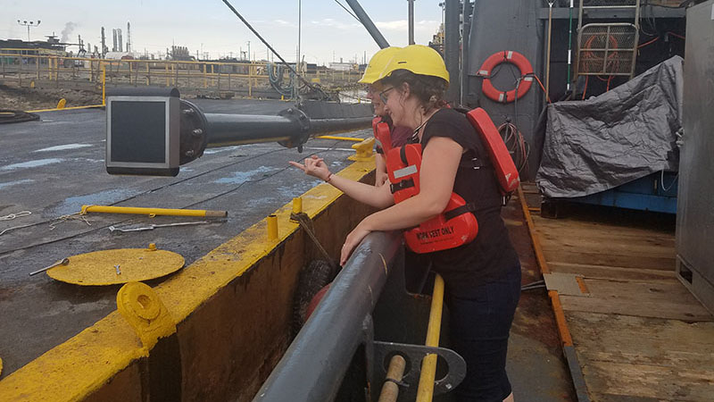 Metcalfe (front) and Tizzard (back) giving the installed parametric sonar system a final check.