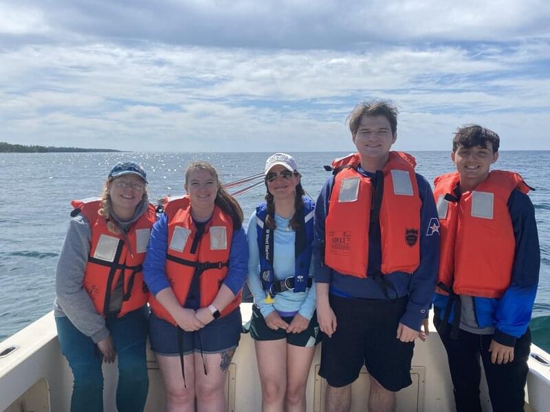 Underwater Archaeology Field School students and Dr. Ashley Lemke on Research Vessel Blue Traveler during the Discovering the Submerged Prehistory of the Alpena-Amberley Ridge in Central Lake Huron expedition.