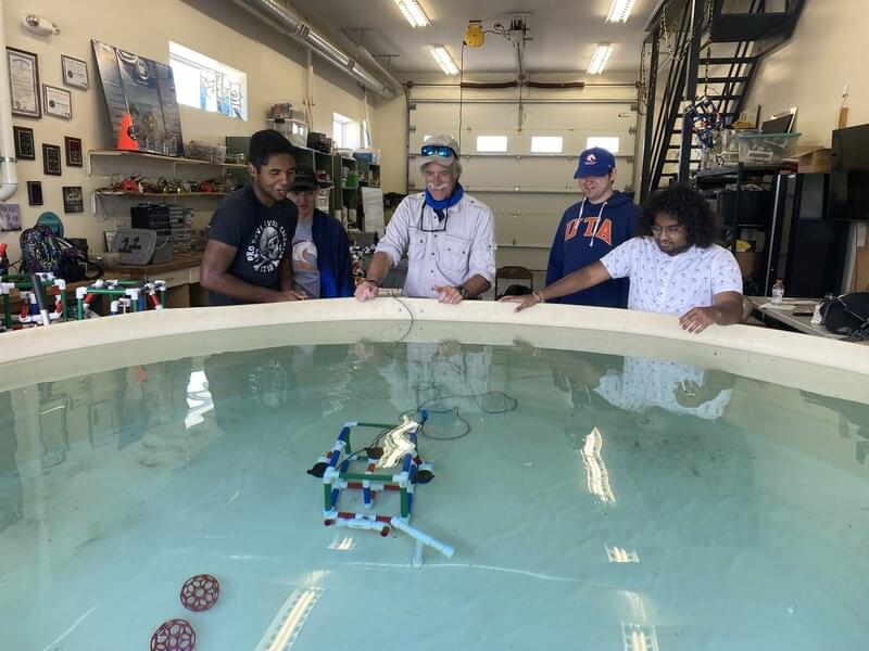 Undergraduate students from Texas test piloting the remotely operated vehicles they built during the Discovering the Submerged Prehistory of the Alpena-Amberley Ridge in Central Lake Huron expedition in the laboratory pool.