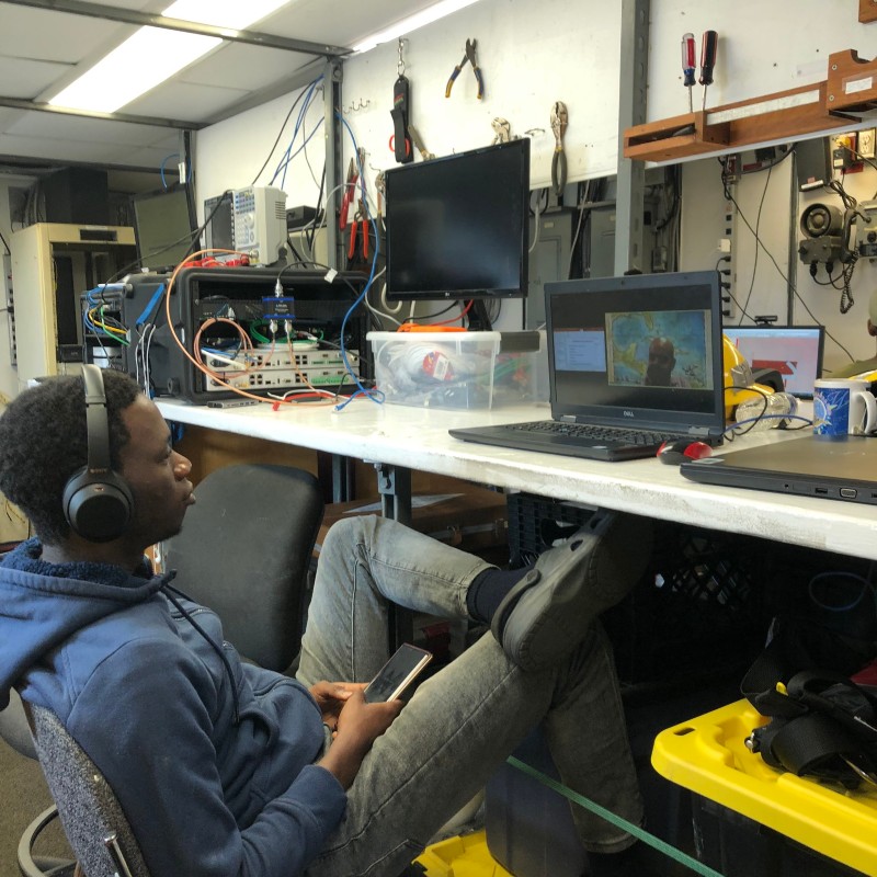 prepares to pull the release pin for the ultra-short baseline (USBL) calibration mooring.