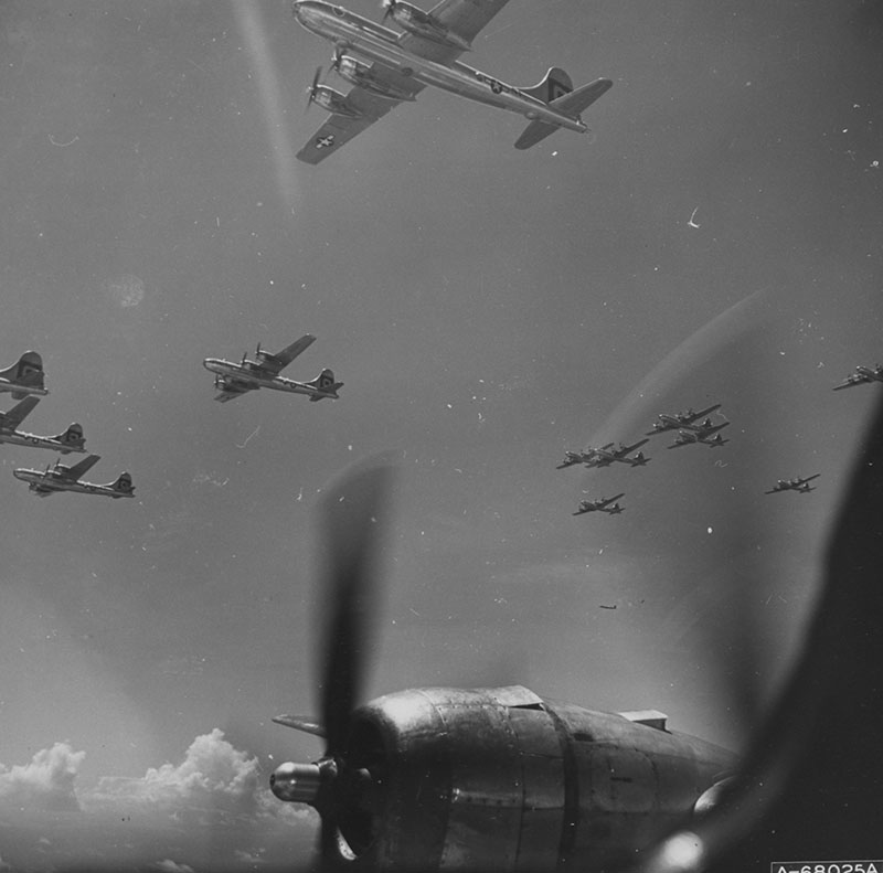 B-29s, like those being searched for during the Deepwater Surveys of World War II U.S. Cultural Assets in the Saipan Channel expedition, in formation on a bombing mission to Japan.