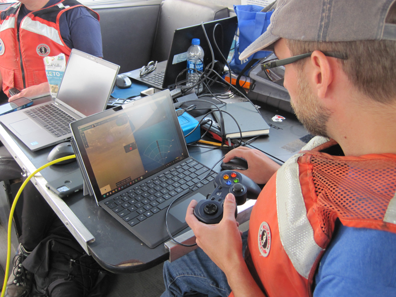 The Machine Learning for Automated Detection of Shipwreck Sites from Large Area Robotic Surveys expedition team conducts detailed remotely operated vehicle operations over a shallow-water shipwreck site.