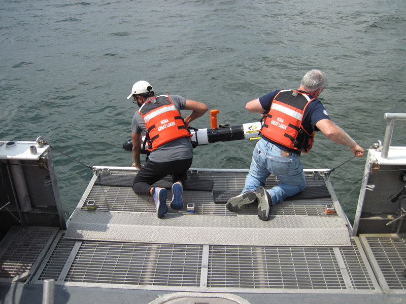Michigan Technological University's autonomous underwater vehicle Iver 3 is recovered following a long and deep sonar mapping mission during the Machine Learning for Automated Detection of Shipwreck Sites from Large Area Robotic Surveys expedition.