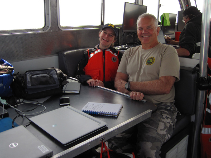 Machine Learning for Automated Detection of Shipwreck Sites from Large Area Robotic Surveys expedition principal investigator and project lead Dr. Katherine Skinner (University of Michigan) and State of Michigan marine archaeologist Dr. Wayne Lusardi onboard Research Vessel Storm.