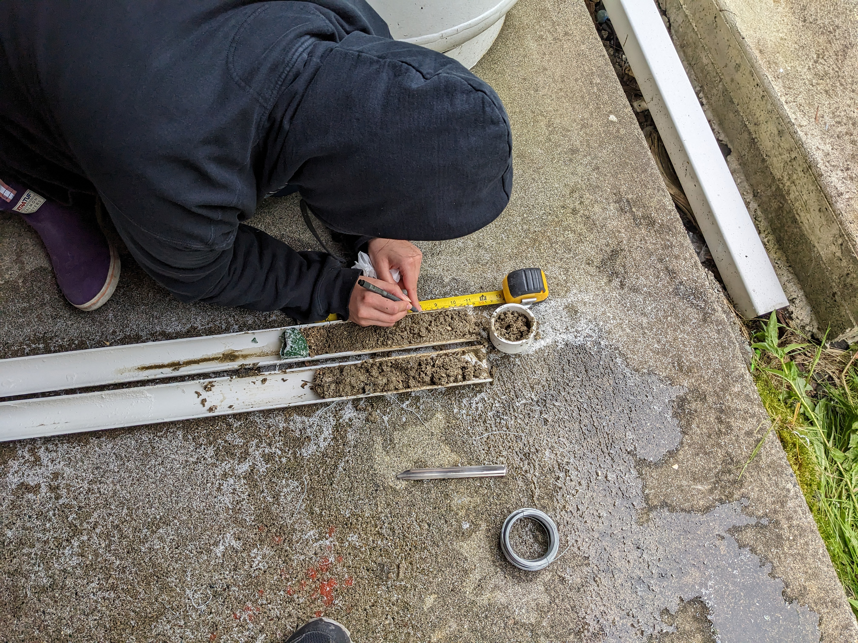 Taylor Heaton records a sediment core collected during the Our Submerged Past expedition.