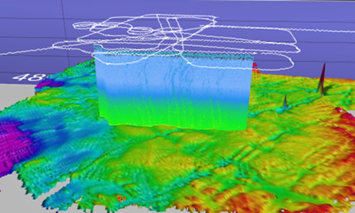 3D topographic map with colored elevations and a translucent vertical rectangle.