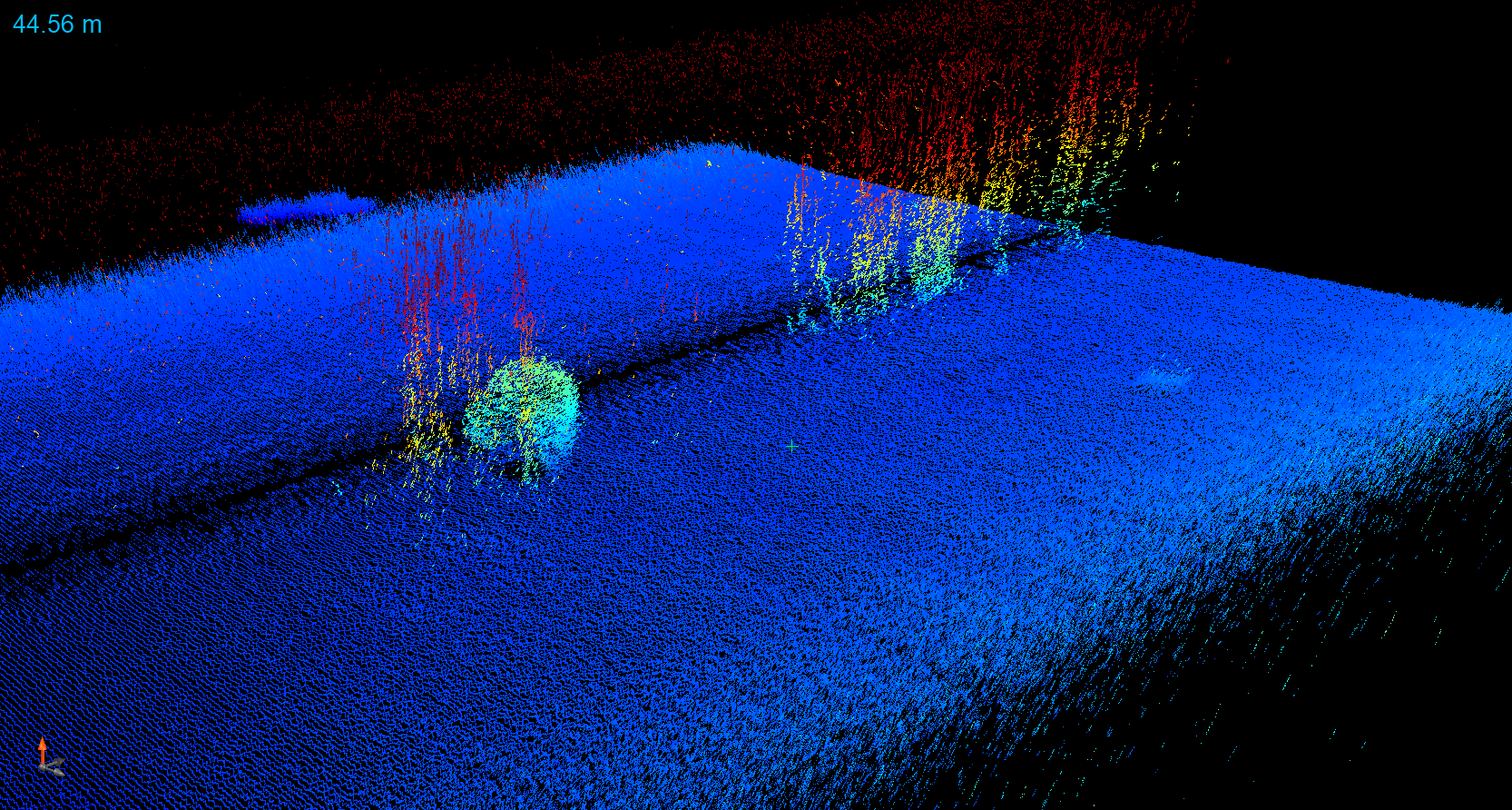 Preliminary point cloud data from a Trimble SX10 scanning total station set up on boulders on the shoreline of Agat facing inland to measure bank erosion at the shoreline in February 2023.