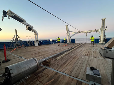 The gravity corer strapped down to the back deck of Research Vessel Falkor (too). This tool was used to collect sediment cores from the seafloor for the Exploring Deep-Sea Methane Seeps Along the Chile Margin project.