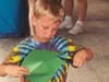 Boy making a paper sea turtle