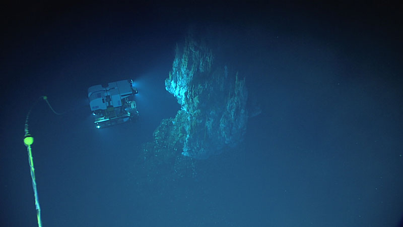 Remotely operated vehicle Deep Discoverer surveys an active hydrothermal vent that was discovered during the 2016 Deepwater Exploration of the Marianas. During Voyage to the Ridge 2022, we expect to explore similar hydrothermal vents, documenting the life that these features support.