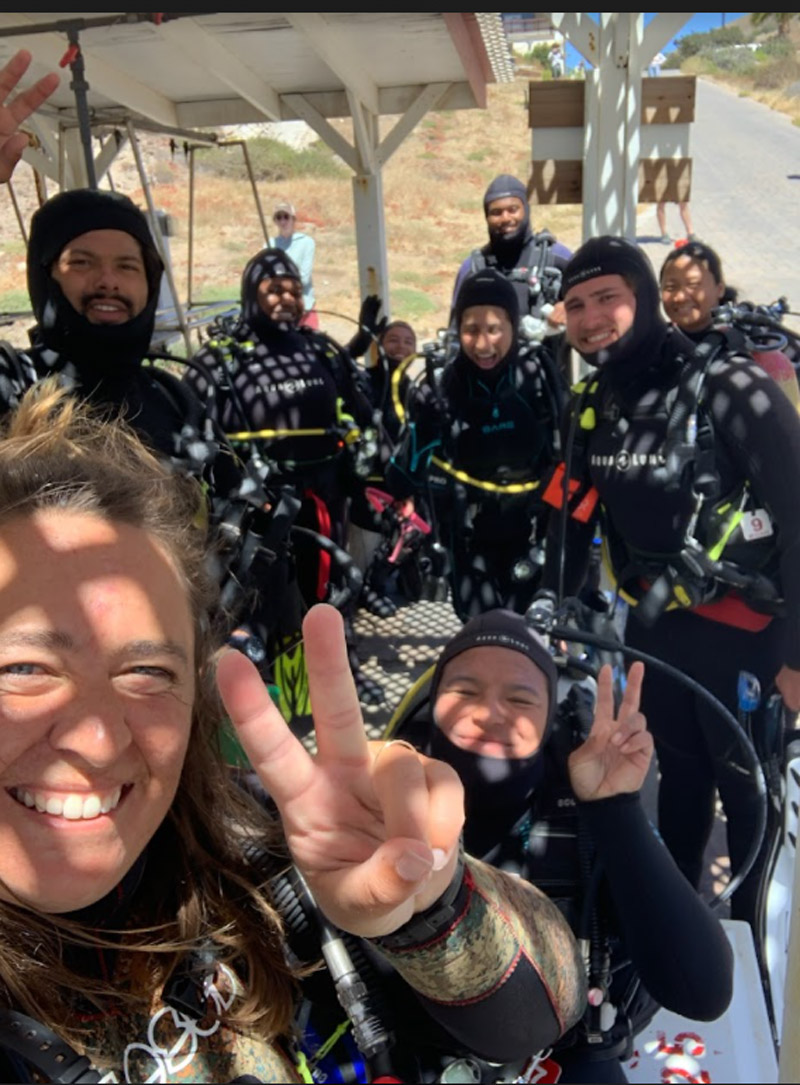 The student cohort and an instructor gather at the Wrigley Institute for Environmental Studies on Santa Catalina Island as they prepare to practice underwater field techniques.