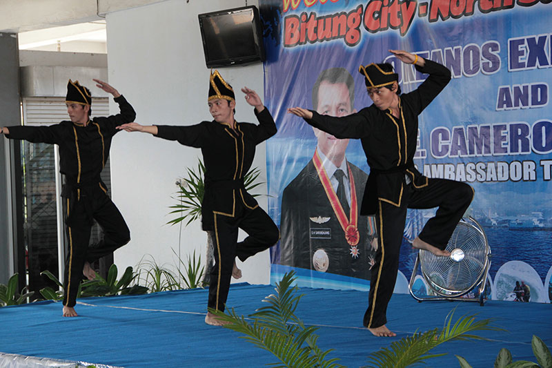 Local dancers perform during the Welcoming Ceremony for the Okeanos Explorer.