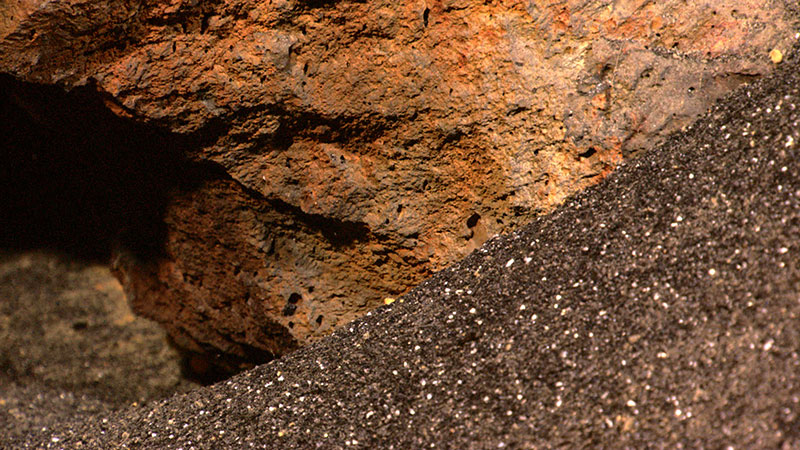 Many of the rocks we see exposed on the western slope of Kawio Barat are highly vesicular, meaning they are full of holes left by gas bubbles present in the lava as it froze during eruption. The lavas here must have been exceptionally rich in gas to produce so many gas bubbles at a depth of nearly 2,000 meters (6,562 feet).