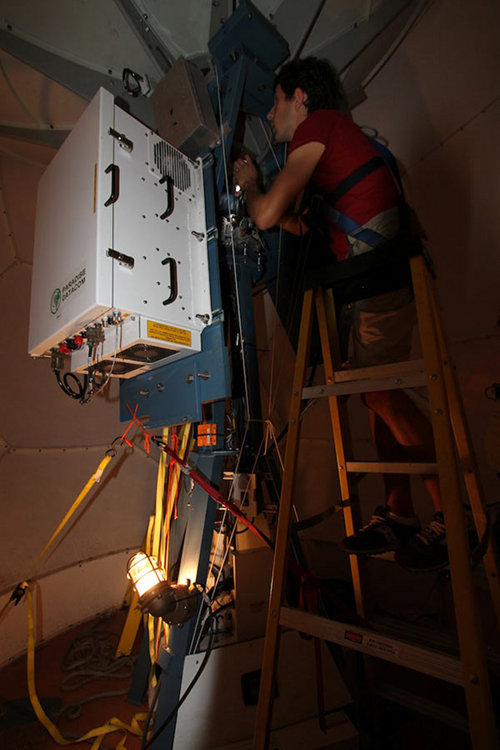 Telepresence Engineer Greg Diffendale takes photos of the VSAT antenna during the Puntarenas inport. Information sent from the ship to technicians back in the U.S was critical to minimizing the delay.