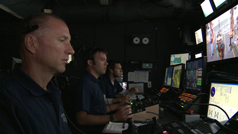 Jeff Williams (ROV Co-Pilot), Karl McKletchie (ROV Pilot) and Nick Kraus (ROV Navigator) in the Control Room.
