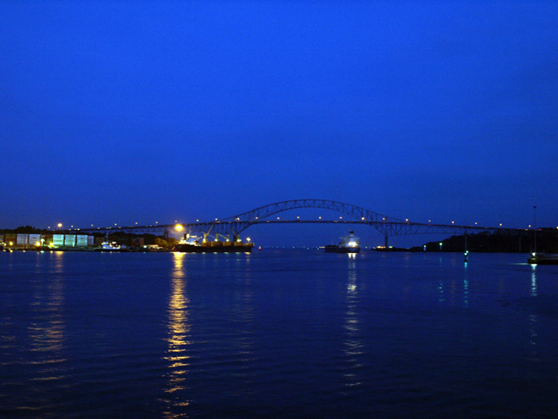 A photo of the “Bridge of the Americas“ is taken as Okeanos Explorer departs Rodman..