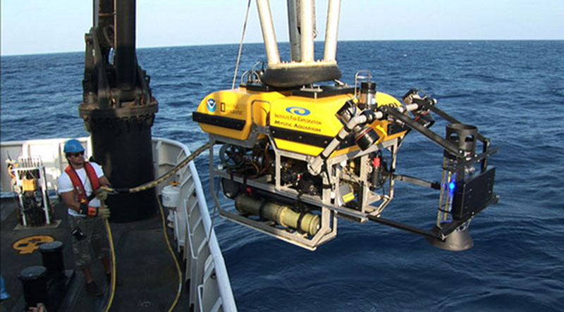 A gas capture device, affectionately known as the methane bucket, was added to the front of the Little Hercules remotely operated vehicle for several dives. Gas from natural seafloor seeps was captured in the device at depth, where it forms a mix of hydrate (methane ice) and gas, and was then brought to shallower, warmer waters, where the hydrate dissociated, in order to estimate the volume of gas collected.