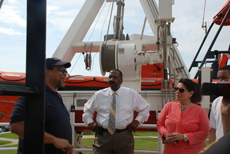 Chief Electronics Technician for the Okeanos Explorer Richard Conway explains technology in the ship's satellite dome.