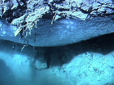 Methane gas hydrate formed underneath a rock overhang at the seafloor on the Blake Ridge cold seep off the coast of South Carolina.