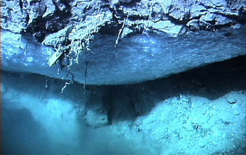 Methane gas hydrate formed underneath a rock overhang at the seafloor on the Blake Ridge cold seep off the coast of South Carolina.
