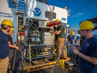 NOAA’s Office of Ocean Exploration and Research’s ROV team prepares the ROV Deep Discoverer for the first dive of the mission.