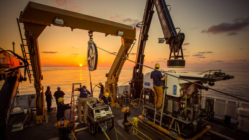 The remotely operated vehicle (ROV) team works on the vehicles following completion of a dive, and readies them for the next day.