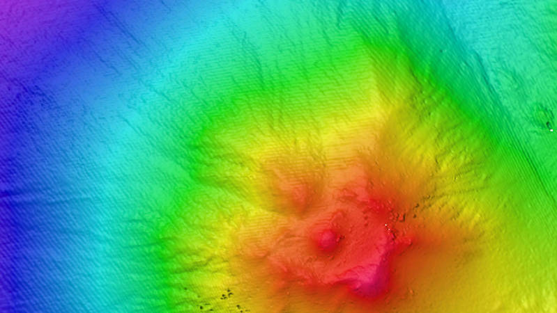 The volcanic features, Target K and Naung, have similar shapes and depths.