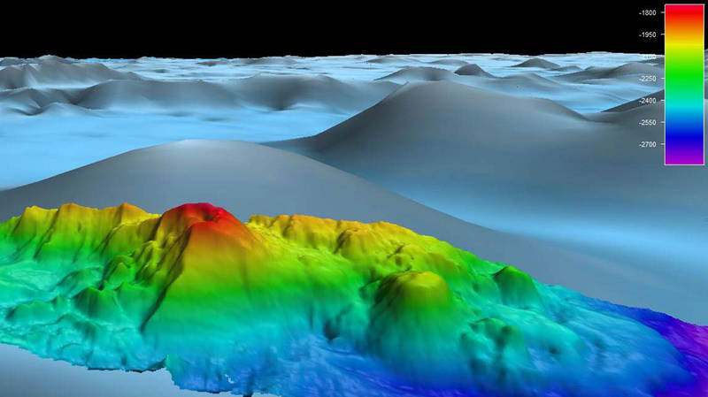 As the ship transits over the East Pacific Rise, scientists are using multibeam sonar to collect high-resolution mapping data, providing a more-detailed look at the seafloor and revealing previously unknown features, such as this knoll.