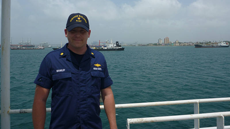 Lieutenant Commander James Brinkley on the deck of NOAA Ship Okeanos Explorer.
