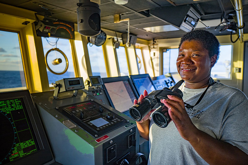 GVA Nicky Applewhite stands the lookout watch as we map our way to our next dive site.