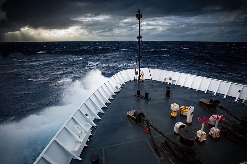 The Okeanos Explorer beats its way into heavy seas. 