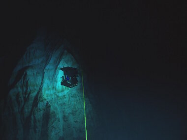 View of our ROV Deep Discoverer exploring at the depth of 6000m in the Mariana Trench. Never before seen geological features reminiscent of the Alps and canyons in California stunned participating scientists on the ship and on shore.