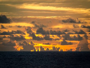 Sunset seen from the back deck of the Okeanos Explorer as the ship heads back to Apia, Samoa.