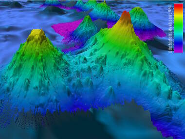 Multibeam bathymetry of Pao Pao Seamount (right) and an unnamed guyot (left) shows one example of nearby seamounts with very different geomorphology. Pao Pao Seamount comes to a very sharp peak at around 300 meters and shows steep flanks while the unnamed feature has a distinct flat top. Biological communities we find on these features may differ greatly at similar depth intervals despite being only 25 kilometers apart from each other.