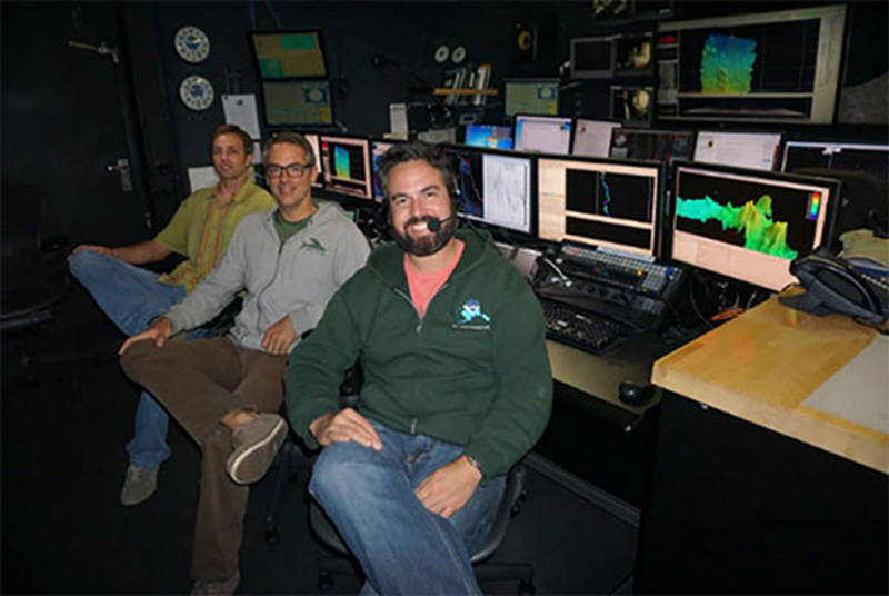 Mapping personnel on the Discovering the Deep: Exploring Remote Pacific MPAs expedition: Mapping Lead Derek Sowers, Watch Lead Jason Meyer, and Survey Technician Charles Wilkins.