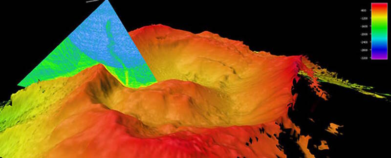 A plume of bubbles is shown rising from the seafloor at Vailulu’u Seamount in the mid-water multibeam sonar data, collected during the 2017 American Samoa expedition. Image courtesy of the NOAA Office of Ocean Exploration and Research, 2017 American Samoa.