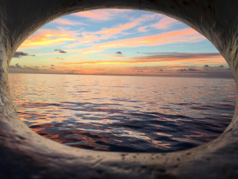 The last sunset during the Mountains in the Deep: Exploring the Central Pacific Basin expedition aboard NOAA Ship <em>Okeanos Explorer</em>.