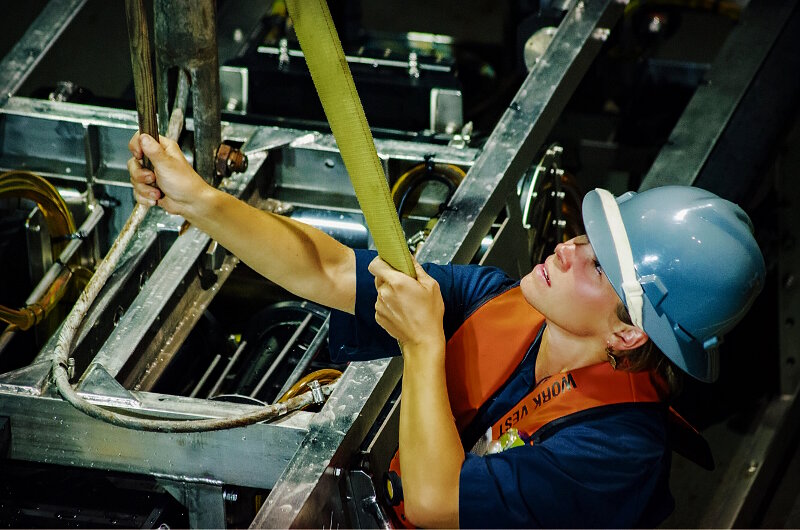 Lindsey Houska deftly secures camera sled Seirios on the deck of NOAA Ship Okeanos Explorer.