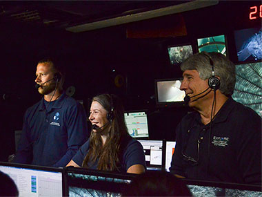 Engaging and educating the public about the value of ocean exploration is a key part of the NOAA Office of Ocean Exploration and Research (OER) mission. During today’s dive, Global Foundation for Ocean Exploration Engineer, Chris Ritter (left), OER Expedition Manager, Kelley Elliott (middle), and CAPSTONE Science Advisor/Hawai'i Undersea Research Lab Program Biologist, Chris Kelley (right), conducted a live interaction with about 20 visitors at the Exploratorium in San Francisco, California.