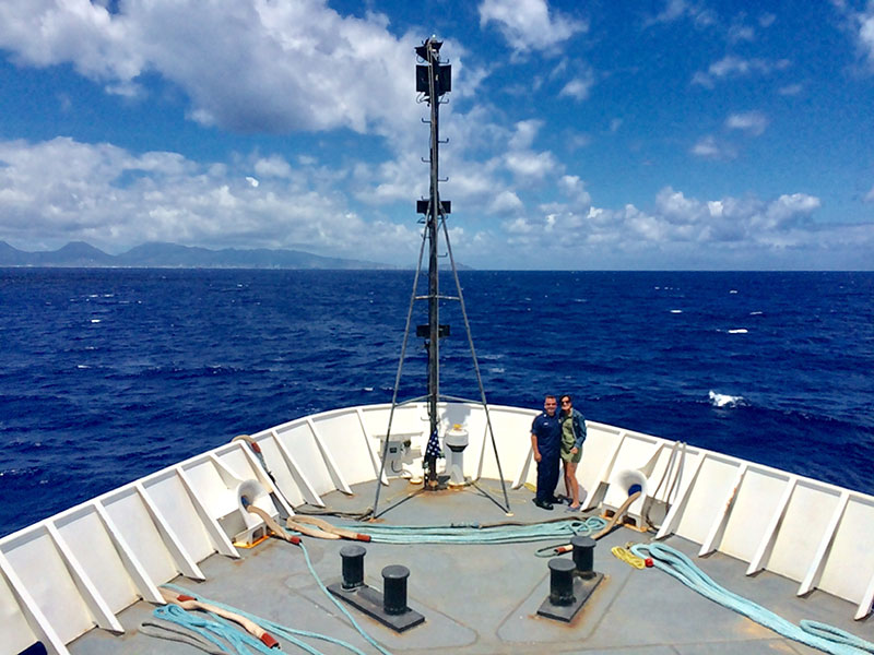 Eric Johnson with his wife on the bow of NOAA Ship Okeanos Explorer during the transit back to Pearl Harbor.